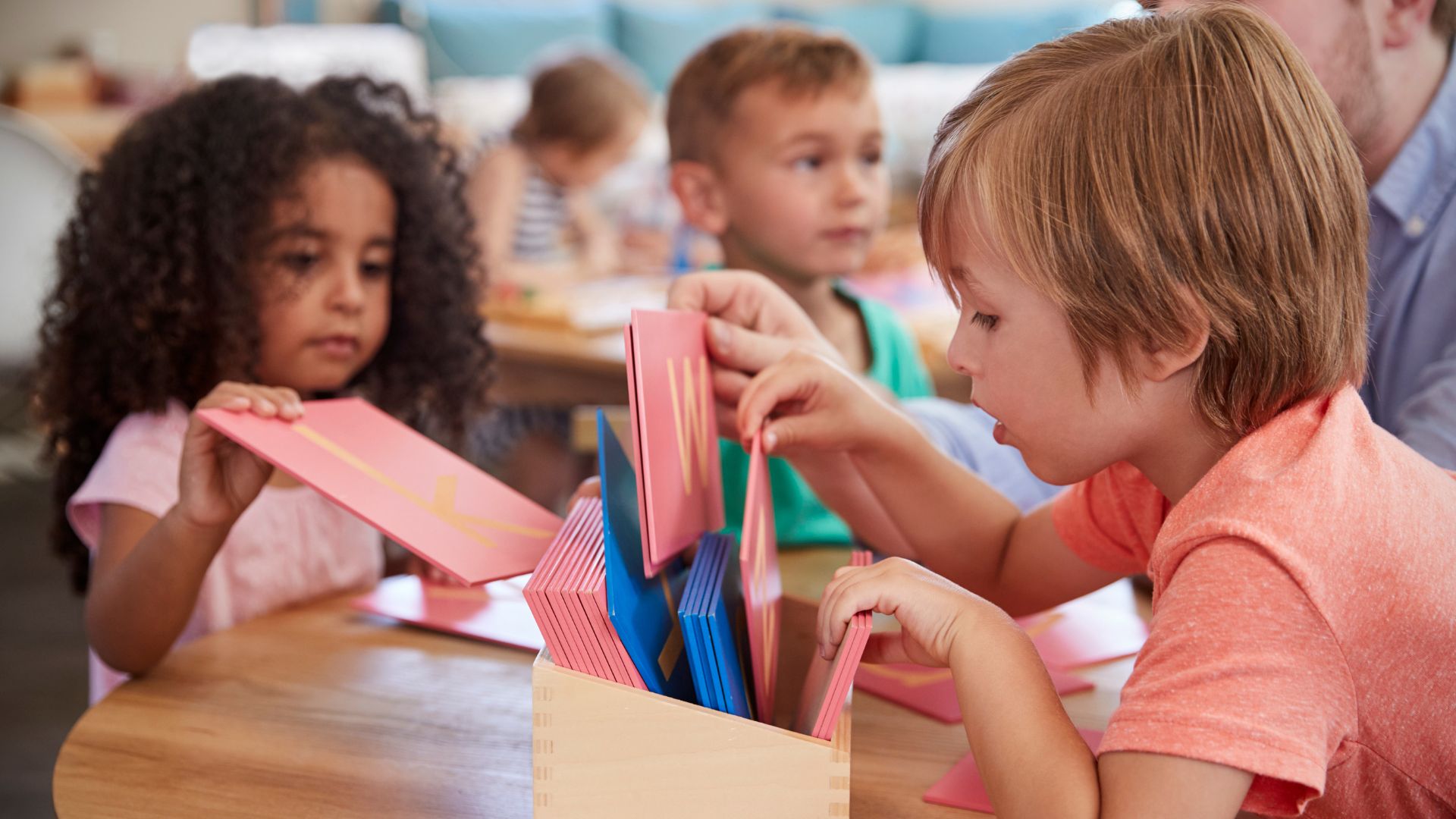 A group of children sitting at a table